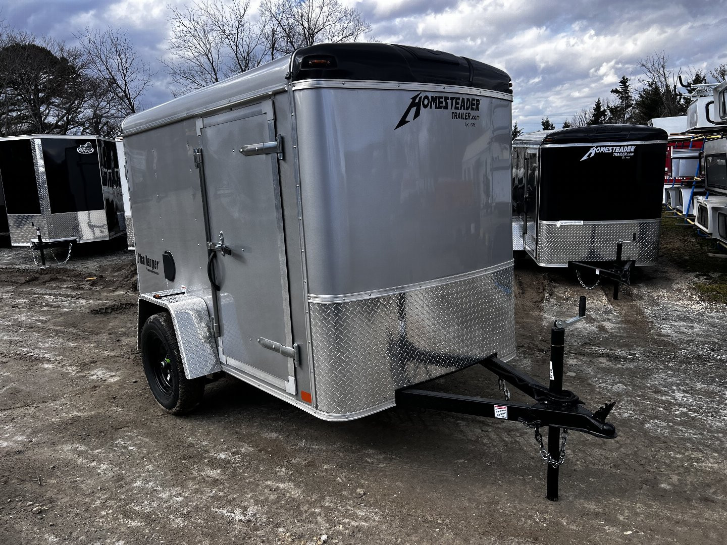 New 2025 Homesteader Trailer / Challenger Series / 5x8 / 5'7" Interior Height / Single Swing Rear Door / 32" Side Door / 24" Stoneguard / .030 Silver Aluminum