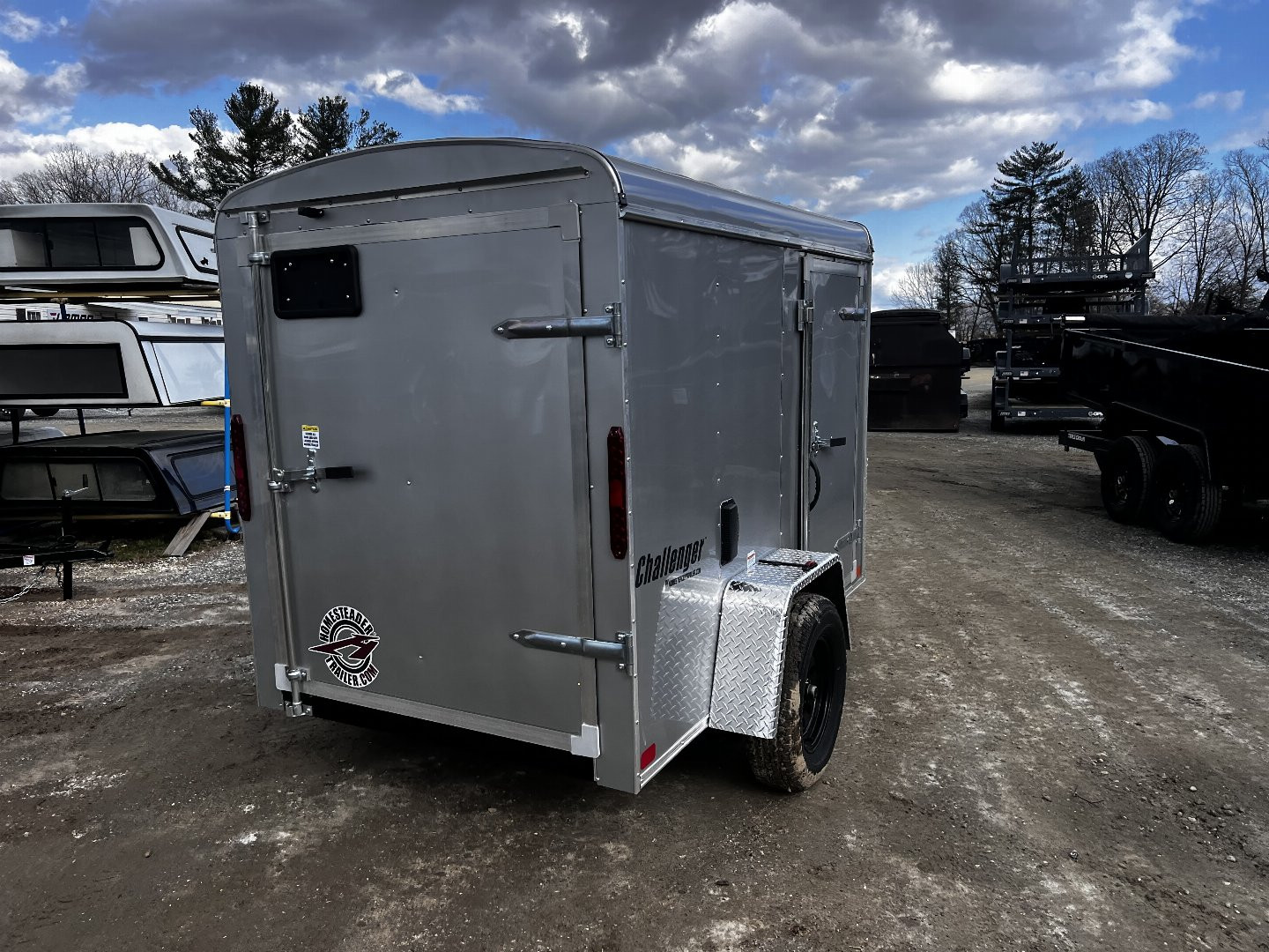 New 2025 Homesteader Trailer / Challenger Series / 5x8 / 5'7" Interior Height / Single Swing Rear Door / 32" Side Door / 24" Stoneguard / .030 Silver Aluminum