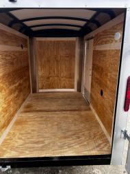 New 2025 Homesteader Trailer / Challenger Series / 5x8 / 5'7" Interior Height / Single Swing Rear Door / 32" Side Door / 24" Stoneguard / .030 Silver Aluminum