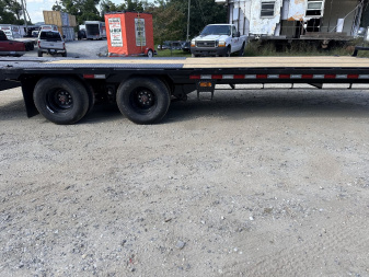 New 2025 Iron Bull FLP Series 102"x25' / 2-10,000# Electric Brake Axles / 16" Dual Wheels / 5' Rampage Ramps / Deckover Trailer