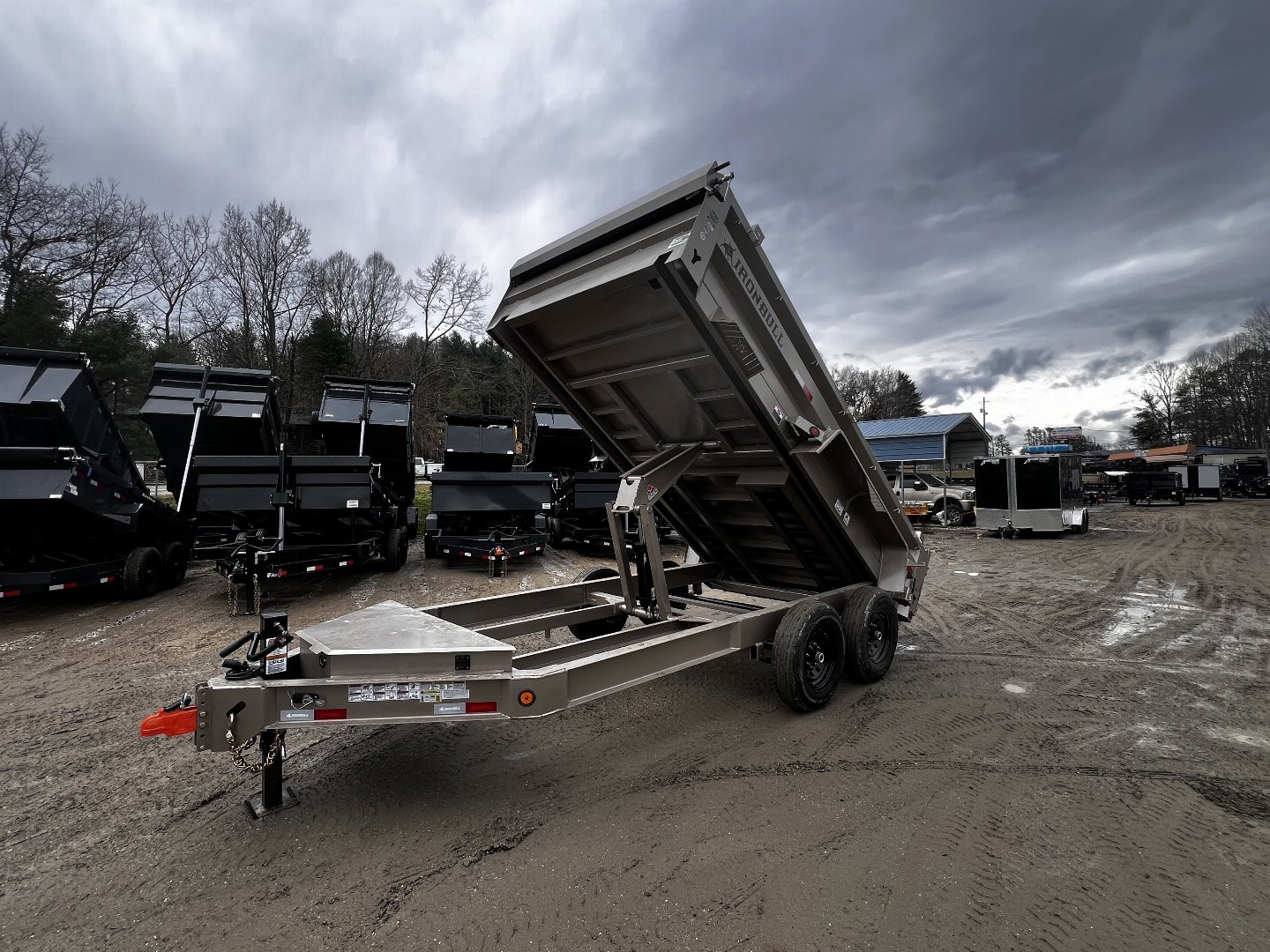 New 2025 Iron Bull Dump Trailer / DWB Series / 83" Wide x 14' Long / 2-7,000# Electric Brake Axles / Tarp / Ramps / Combo Rear Gate / Tan Powder Coat