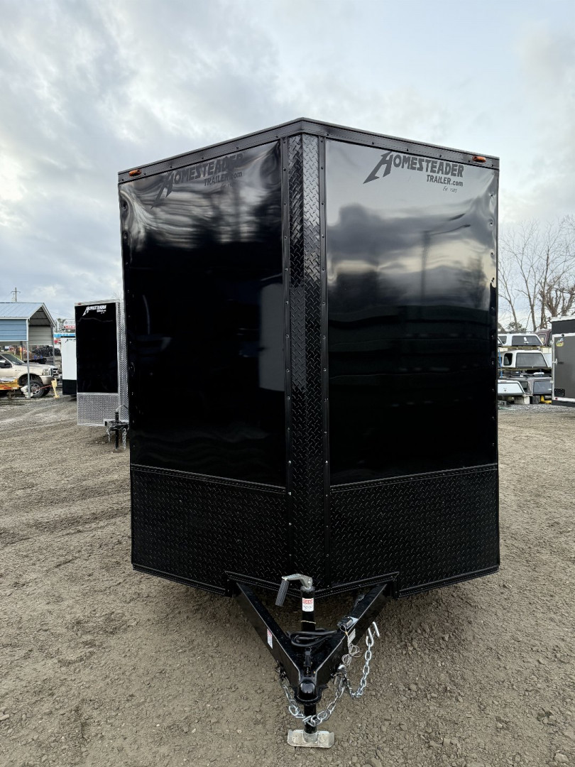 New 2025 Homesteader Trailers / 714IT Intrepid OHV / 7' Interior Height / .030 Black Aluminum w/ Black Out Pkg / Ramp Rear Door / 32" Side Door / 4-Recessed Floor D-Rings / ATP 24" High on sides and ramp door