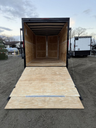 New 2025 Homesteader Trailers / 714IT Intrepid OHV / 7' Interior Height / .030 Black Aluminum w/ Black Out Pkg / Ramp Rear Door / 32" Side Door / 4-Recessed Floor D-Rings / ATP 24" High on sides and ramp door