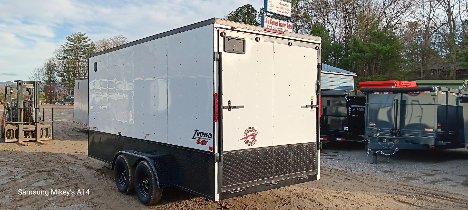 New 2025 Homesteader Trailers / 716IT Intrepid OHV / 7' Interior Height / .030 White Aluminum w/ Black Out Pkg / Ramp Rear Door / 32" Side Door / 4-Recessed Floor D-Rings / ATP 24" High on sides and ramp door