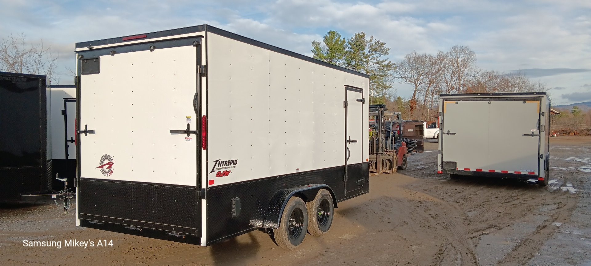 New 2025 Homesteader Trailers / 716IT Intrepid OHV / 7' Interior Height / .030 White Aluminum w/ Black Out Pkg / Ramp Rear Door / 32" Side Door / 4-Recessed Floor D-Rings / ATP 24" High on sides and ramp door