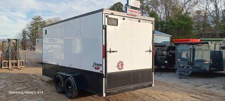 New 2025 Homesteader Trailers / 716IT Intrepid OHV / 7' Interior Height / .030 White Aluminum w/ Black Out Pkg / Ramp Rear Door / 32" Side Door / 4-Recessed Floor D-Rings / ATP 24" High on sides and ramp door