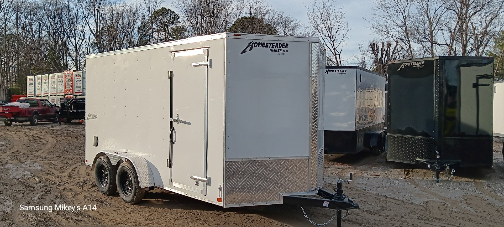 New 2025 Homesteader Trailers / 714IT Intrepid / 6'6" Interior Height / .030 White Aluminum / Ramp Rear Door / 32" Side Door