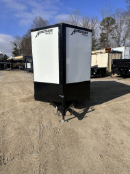 New 2025 HOMESTEADER TRAILER / INTREPID SERIES / 6' WIDE X 12' LONG / 6'6" INTERIOR HEIGHT / WHITE .030 ALUMINUM W/ BLACK OUT PKG / 32" SIDE DOOR W/ RV LOCK / RAMP REAR DOOR / 4-D RINGS / 16" O/C WALL POST