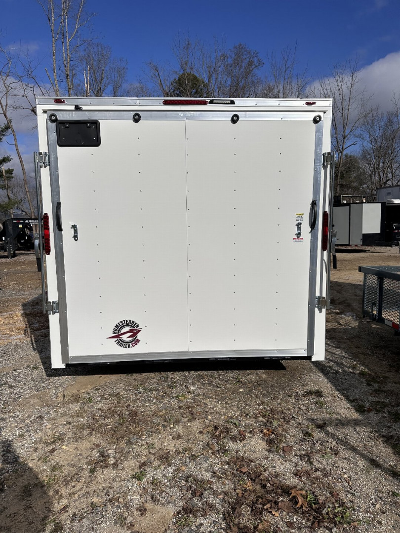 New 2025 HOMESTEADER CARGO TRAILER / INTREPID SERIES / 8..6'X20' / 7' INTERIOR HEIGHT / 32" SIDE DOOR / RAMP REAR DOOR / .080 WHITE POLY CORE ALUMINUM
