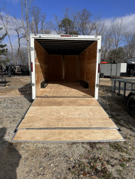 New 2025 HOMESTEADER CARGO TRAILER / INTREPID SERIES / 8..6'X20' / 7' INTERIOR HEIGHT / 32" SIDE DOOR / RAMP REAR DOOR / .080 WHITE POLY CORE ALUMINUM