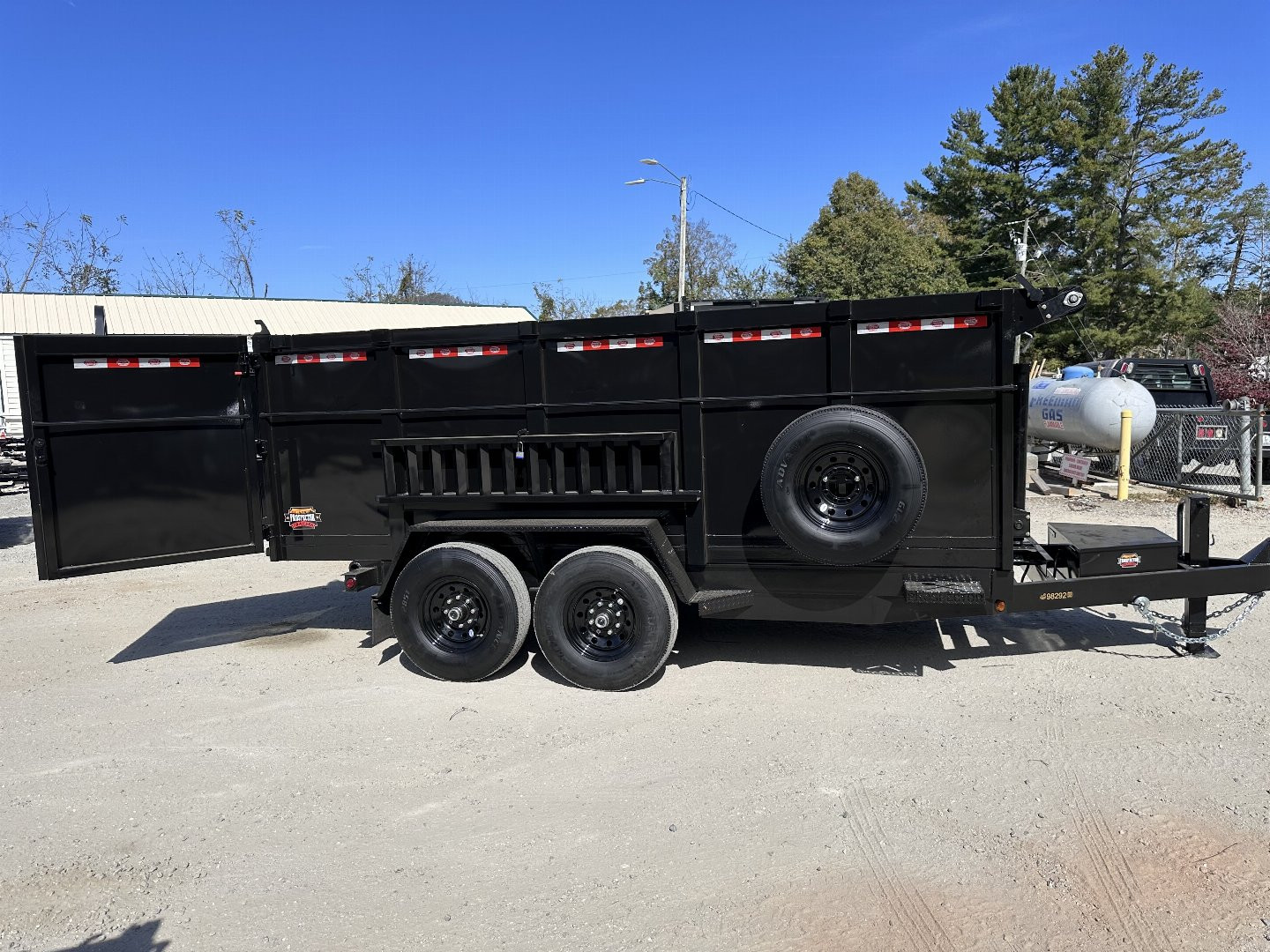New 2025 Prospector 7X14X4X14-T Dump Trailer / 7' Wide x 14' Long / 4' High Sides / Ramps / Tarp / Barn Door Tail Gates / Telescopic Hoist / 14 ply tires / Spare Tire and Wheel