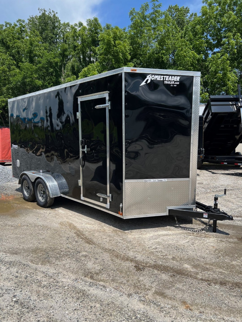 New 2025 HOMESTEADER CARGO TRAILER / INTREPID SERIES / 7'X16' / 7' INTERIOR HEIGHT / 32" SIDE DOOR W/ RV LOCK / RAMPS REAR DOOR / .030 BLACK ALUMINUM