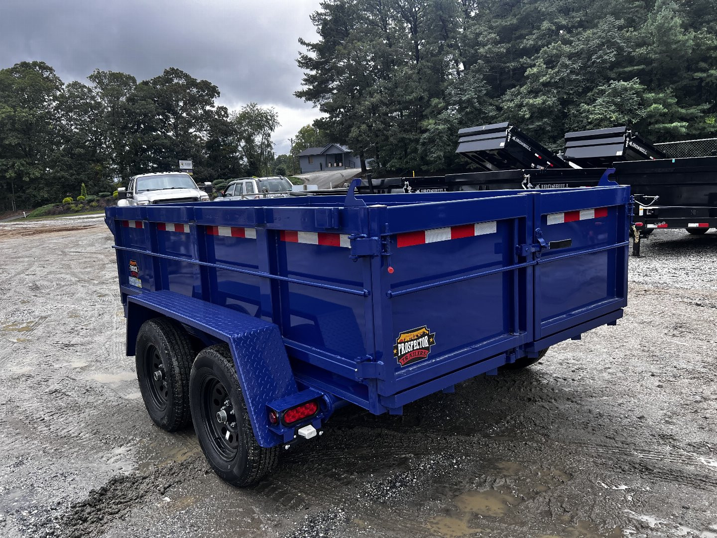 New 2025 Prospector Dump Trailer By Covered Wagon Trailers / D-6X10TA-2-7K Dump Trailer / 6x10 / 2-3500# Electric Brake Axles / 10 Ga 24" High Sides / Barn Door Rear Gate / 10 Ga Steel Floor / Power Up / Power Down Hydraulics