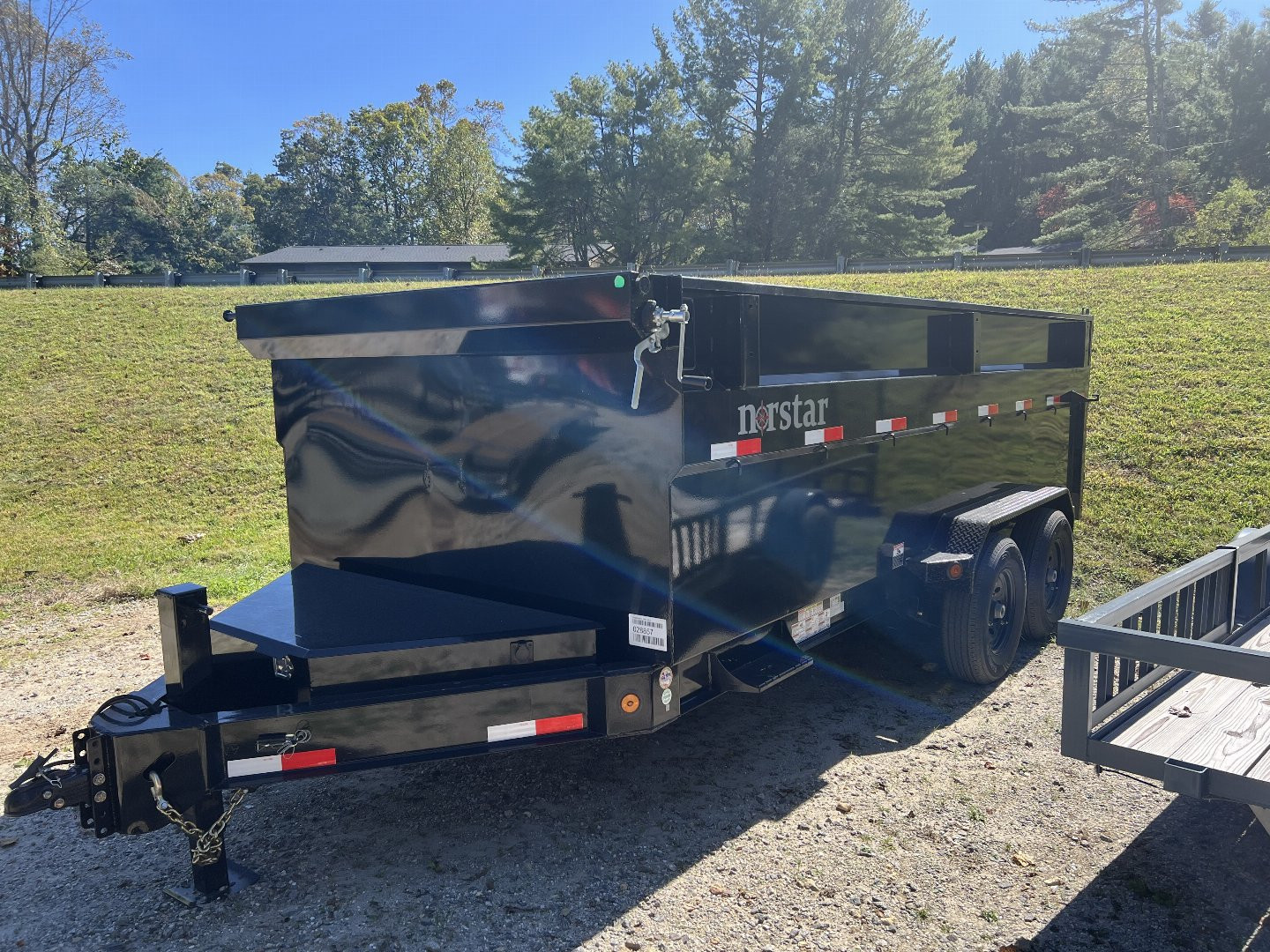 New 2024 Norstar DXB Series / 83" Wide x 16' Long / 2-7000# Electric Brake Axles / 4' Side Walls / Scissor Hoist / Tarp System / Barn Door Gates / Ramps