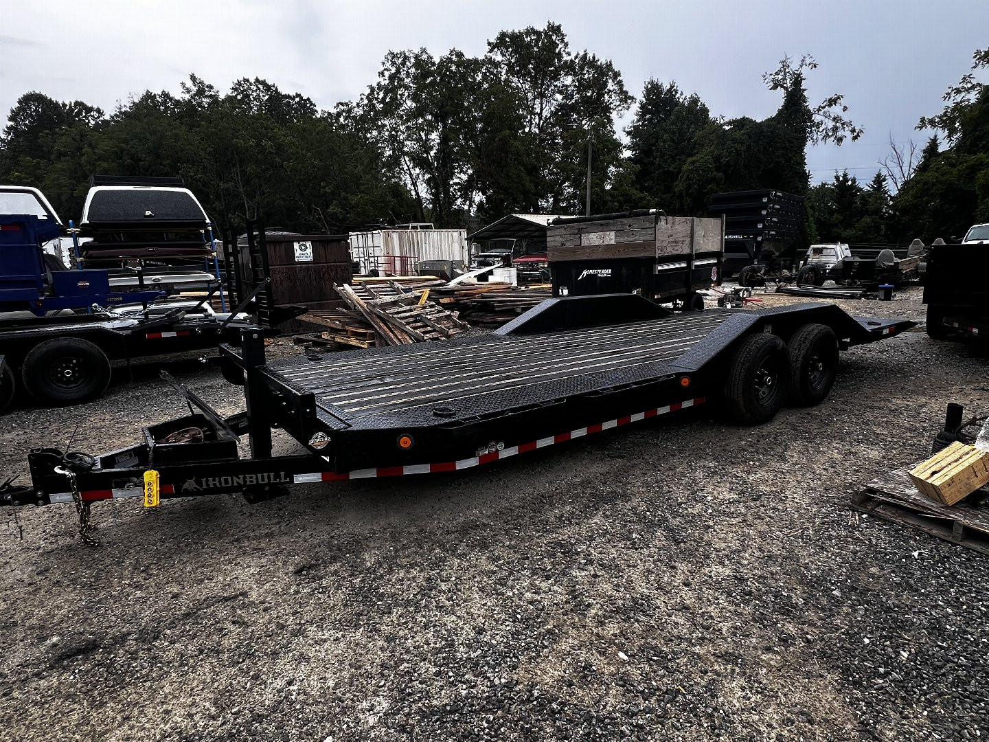 New 2023 Iron Bull Tilt Trailer /TLB Series / 2-7,000# Electric Brake Axles / Full Tilt Deck / Hyd Power Force Tilt / Hyd Jack / Black Wood Floor / Solar Panel