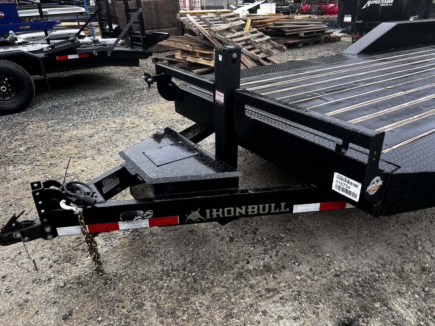 New 2023 Iron Bull Tilt Trailer /TLB Series / 2-7,000# Electric Brake Axles / Full Tilt Deck / Hyd Power Force Tilt / Hyd Jack / Black Wood Floor / Solar Panel