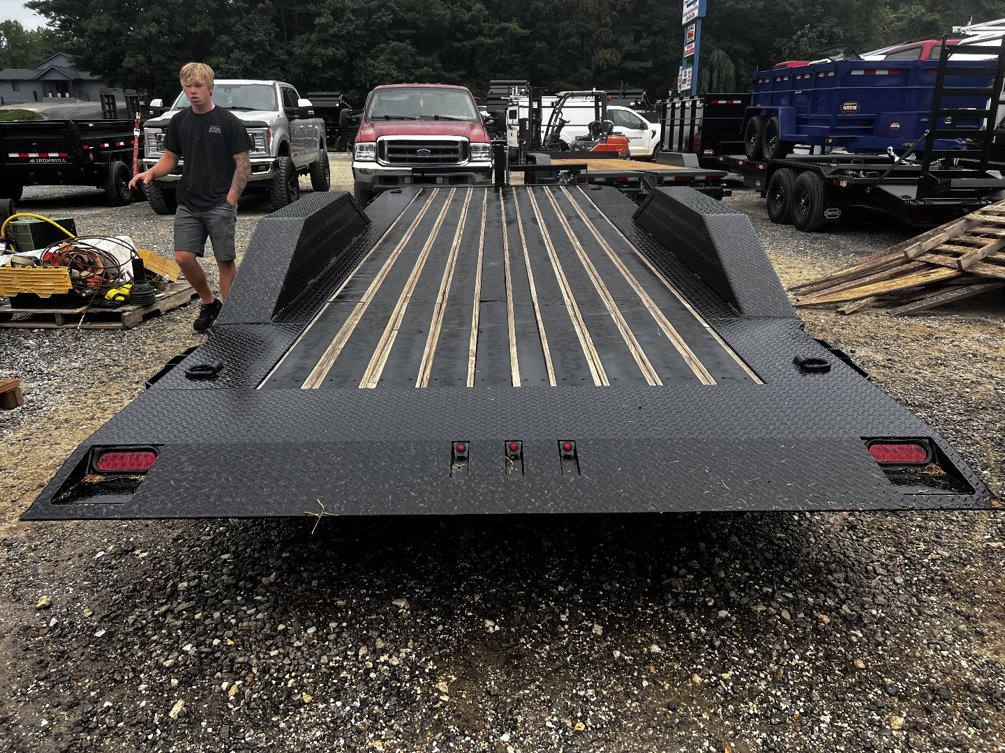 New 2023 Iron Bull Tilt Trailer /TLB Series / 2-7,000# Electric Brake Axles / Full Tilt Deck / Hyd Power Force Tilt / Hyd Jack / Black Wood Floor / Solar Panel