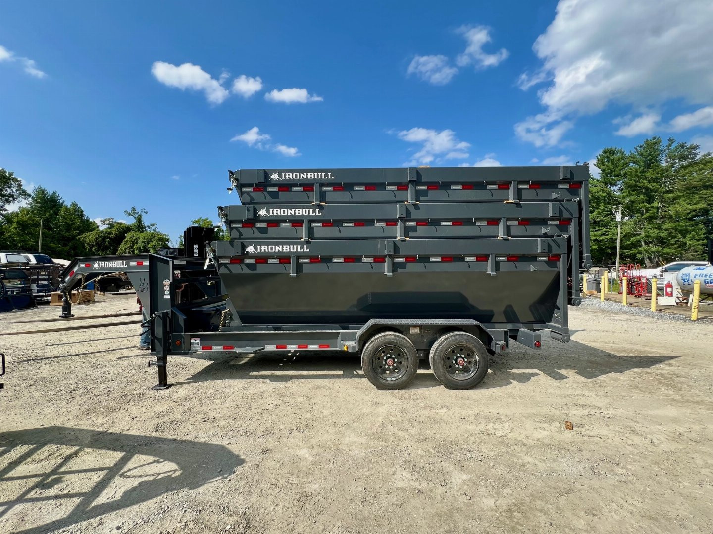 New 2025 IRON BULL / ROLL-OFF DUMP TRAILER / 2-8,000# AXLES / 20 K WARRIOR WINCH / WITH 3-16' DUMP BINS