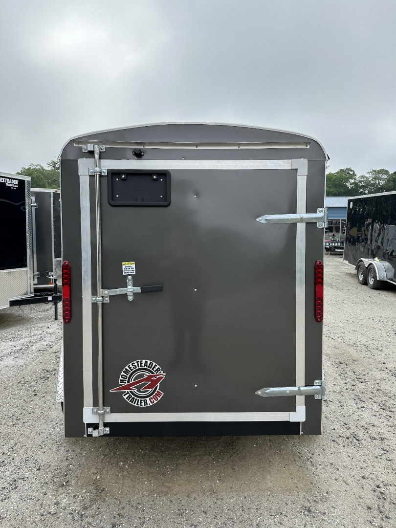 New 2025 Homesteader Trailer / Challenger Series / 5x8 / 5'7" Interior Height / Single Swing Rear Door / 32" Side Door / 24" Stoneguard / .030 Charcoal Gray Aluminum