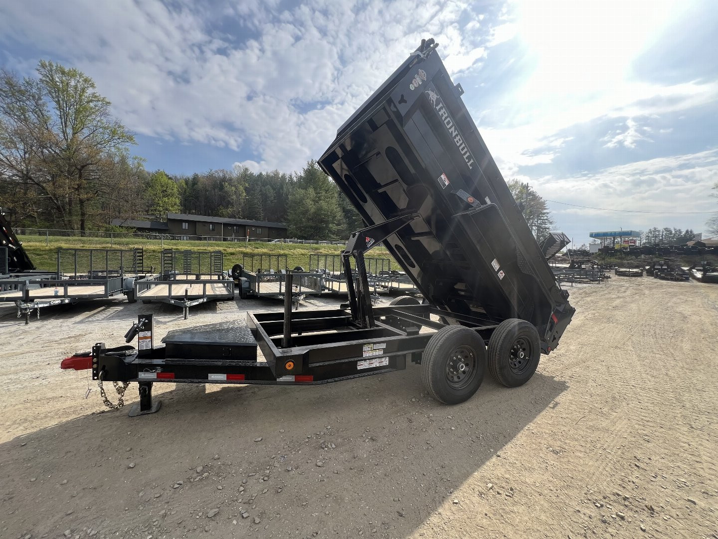 New 2024 Iron Bull DumpTrailers / DTB Series / 72" Wide x 12' Long / Scissor Hoist / 2-5200 # Electric Brake Axles / 24" High Sides / Combo Rear Gate / Tarp System