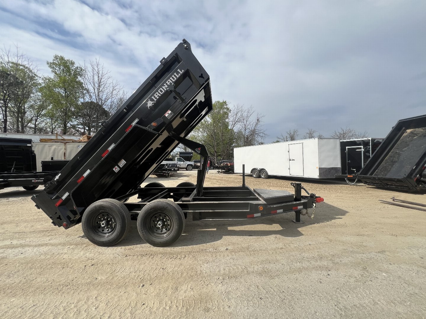 New 2024 Iron Bull DumpTrailers / DTB Series / 72" Wide x 12' Long / Scissor Hoist / 2-5200 # Electric Brake Axles / 24" High Sides / Combo Rear Gate / Tarp System