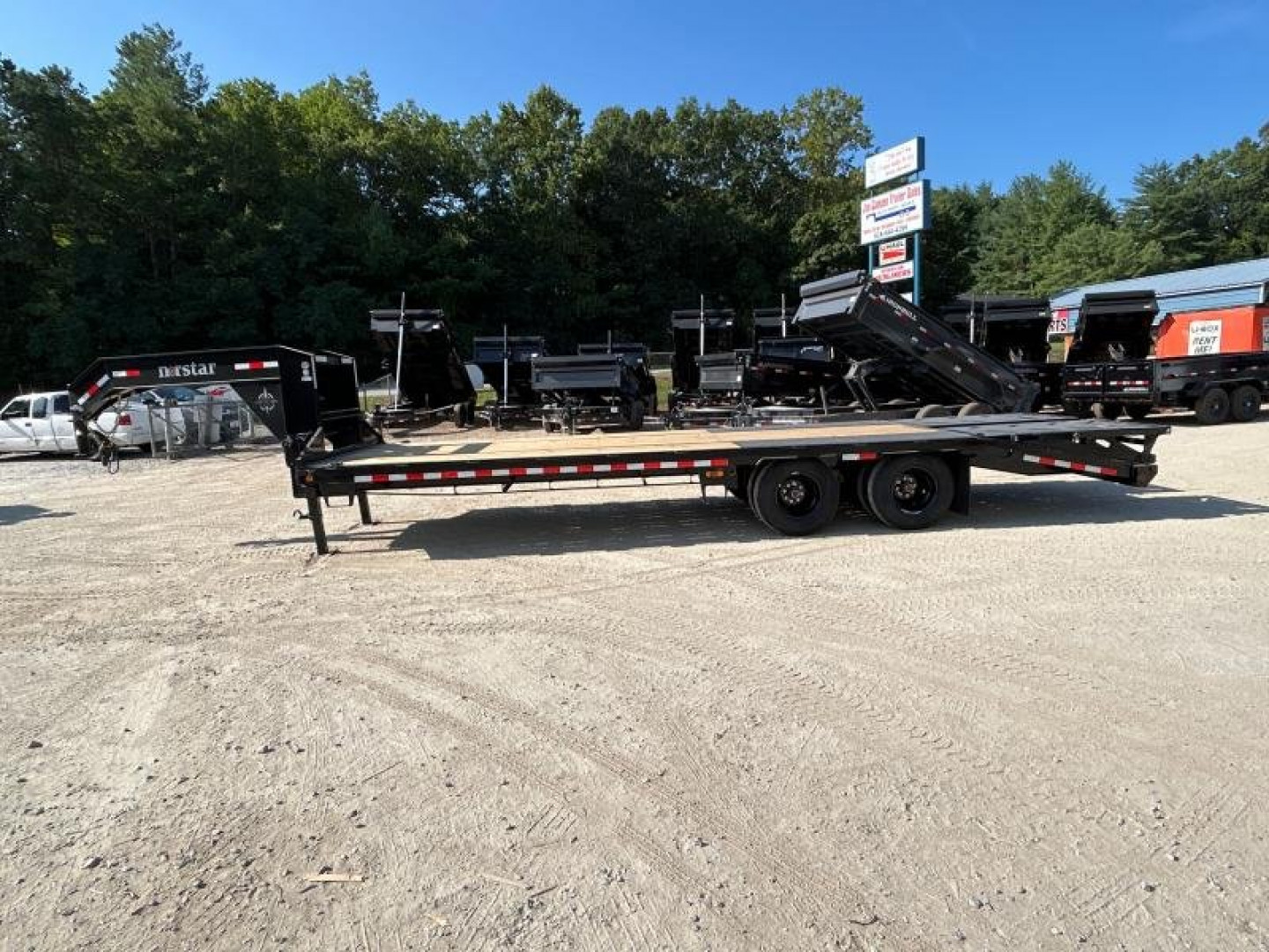 New 2023 Norstar FXG 102 Wide x 25' Long / 2-10,000 # Electric Brake Axles / Rampage Ramps