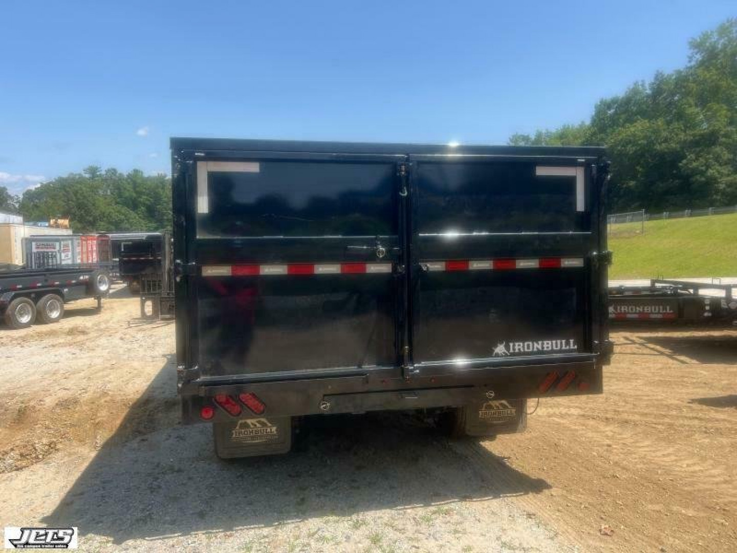 New 2023 Iron Bull DMG Series / 102" Wide x 20' Long / 4' High Sides / Barn Door Gates / 2-10,000# Axles / Black In color / Telescopic Hoist / Side Arm Tarp System