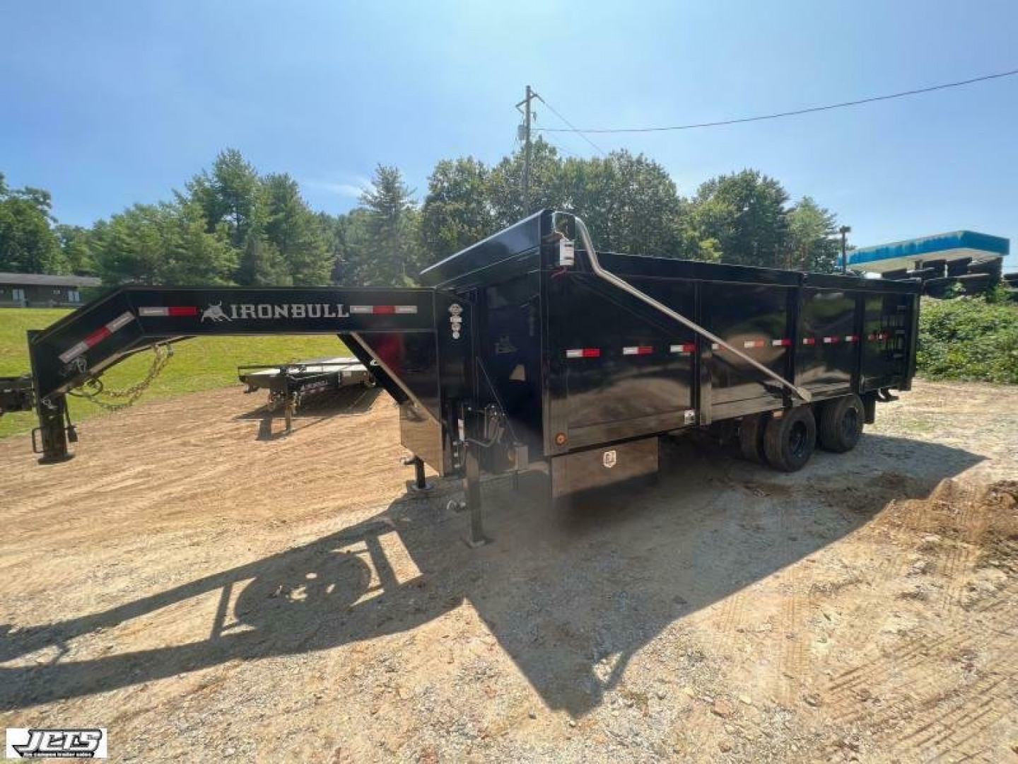 New 2023 Iron Bull DMG Series / 102" Wide x 20' Long / 4' High Sides / Barn Door Gates / 2-10,000# Axles / Black In color / Telescopic Hoist / Side Arm Tarp System
