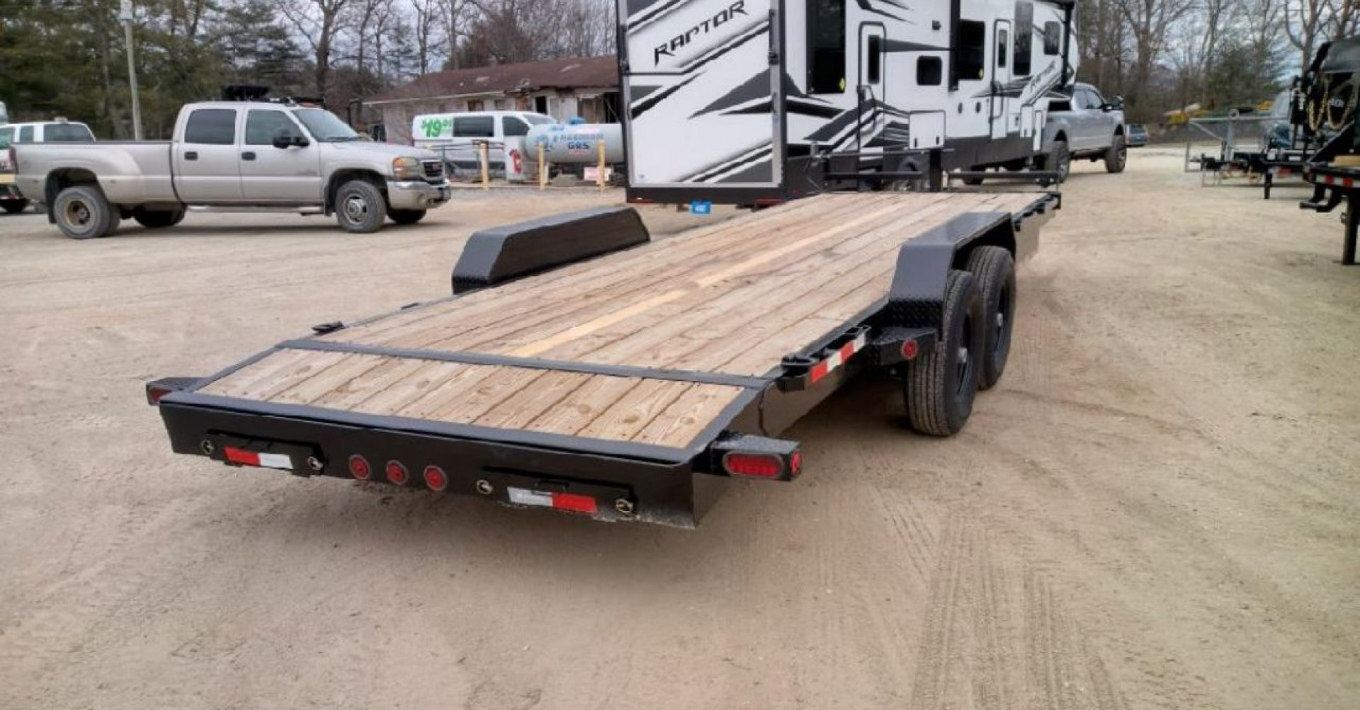 New 2023 IRON BULL ETB Series / 83" Wide x 24' Long / 2-7,000# Electric Brake Axles / Slide In Ramps / Wood Floor