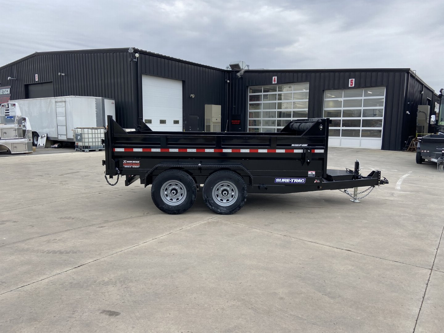 New Sure-Trac 12' Telescopic Dump Trailer
