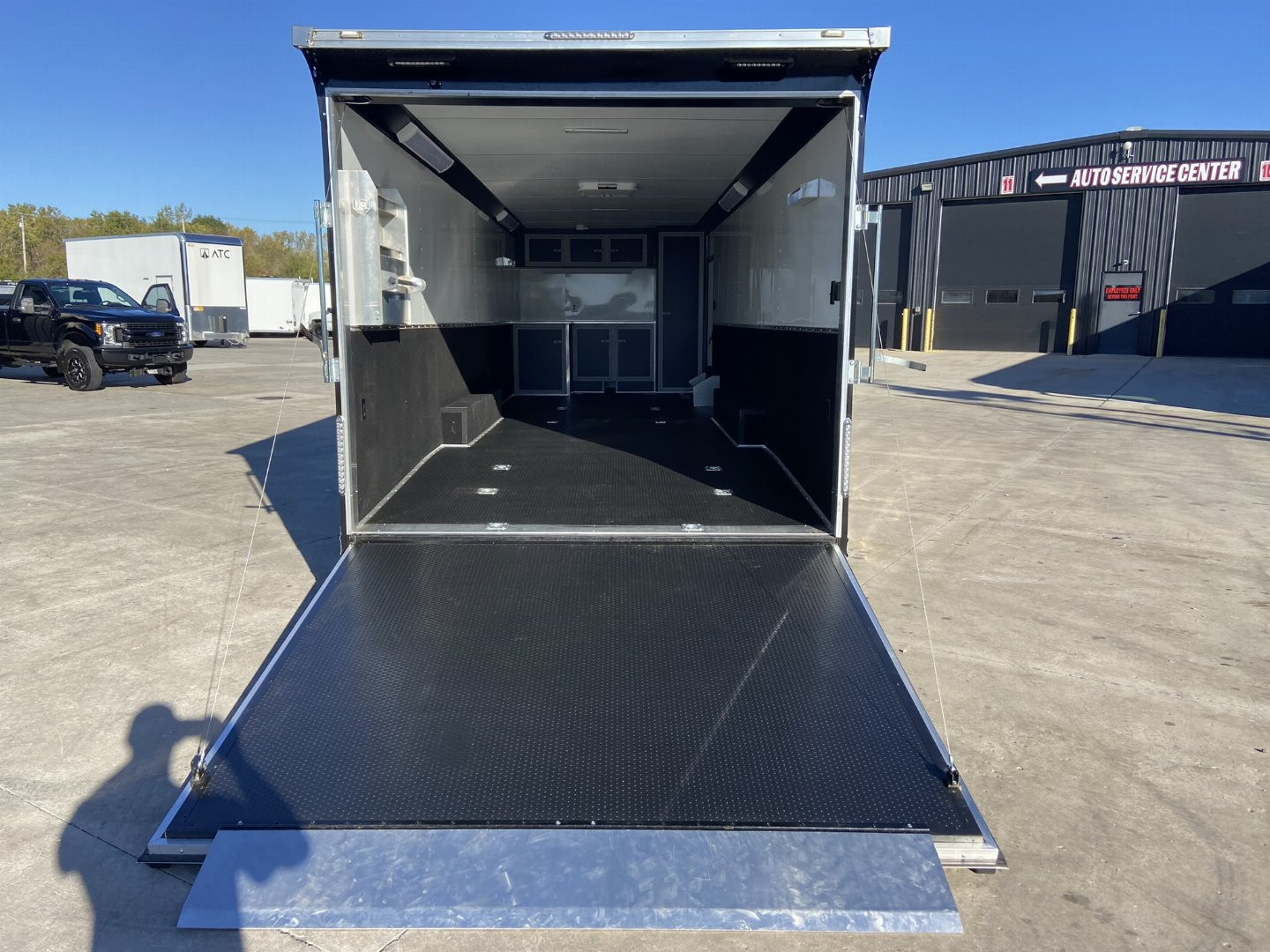 Used 2022 United PREM 8.5x28 Racing Trailer