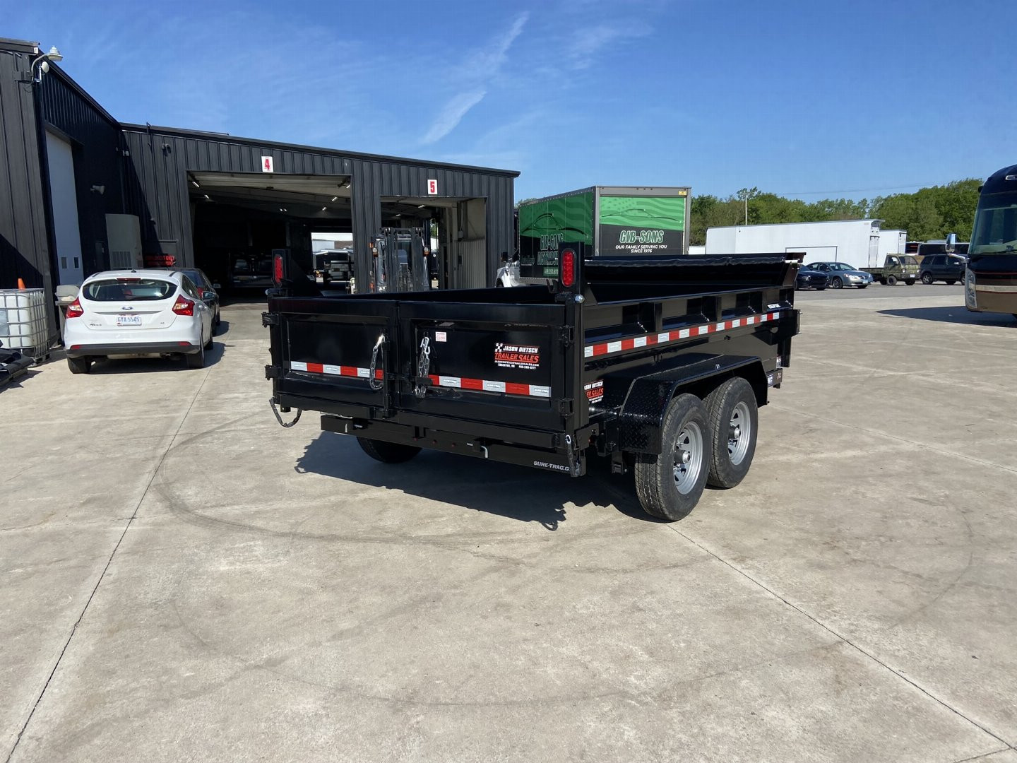 New Sure-Trac 82"x12 HD Low Profile Dump Trailer 12K Dual Ram