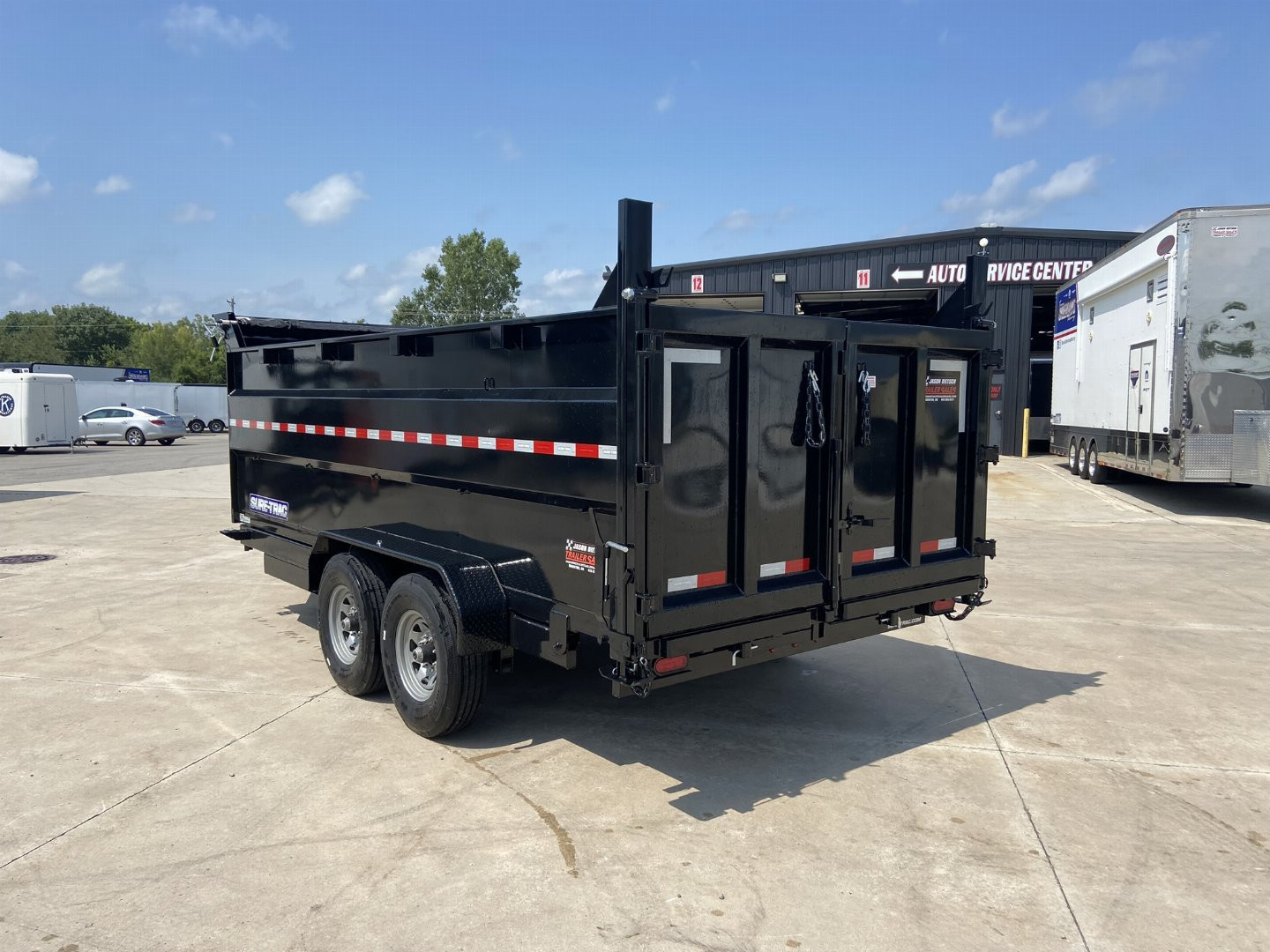 New Sure-Trac 82x16 Dump Trailer with 4' sides and tire upgrade