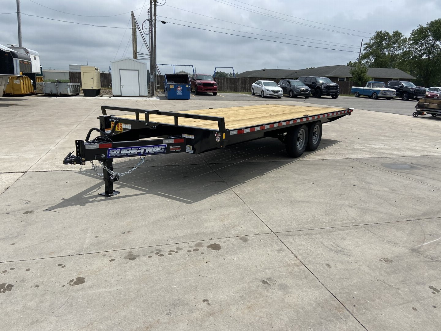 New Sure-Trac 8.5x20 Flat Deckover Trailer with slide in ramps