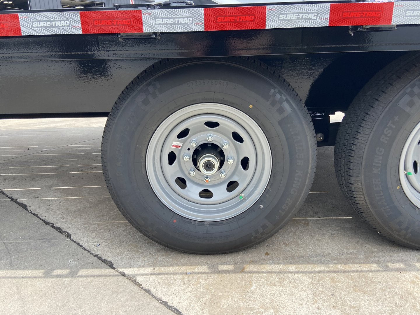 New Sure-Trac 8.5x20 Flat Deckover Trailer with slide in ramps