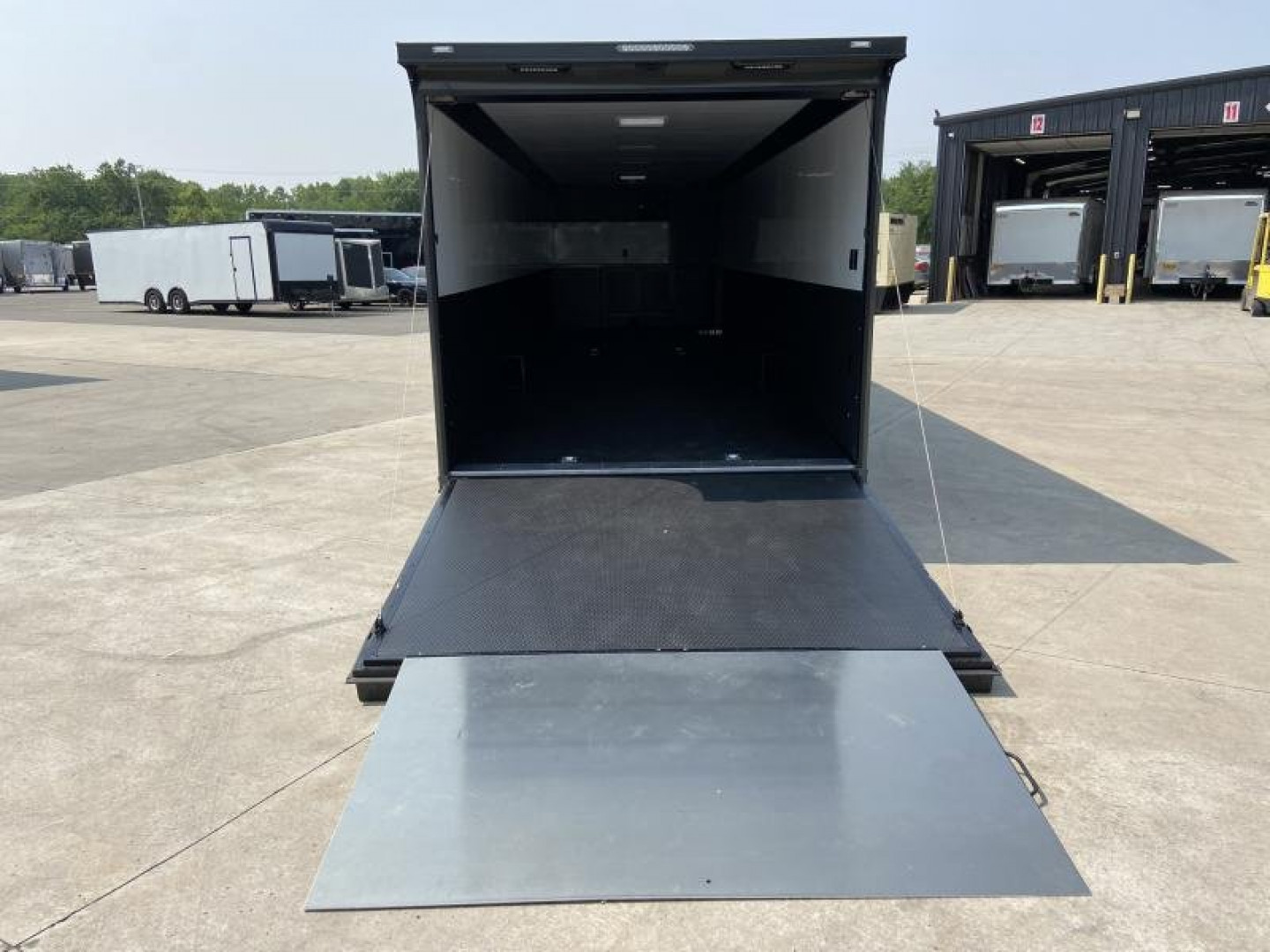 New 34' Car Hauler/Racing Trailer (110V Package & Cabinets) - United Super Hauler