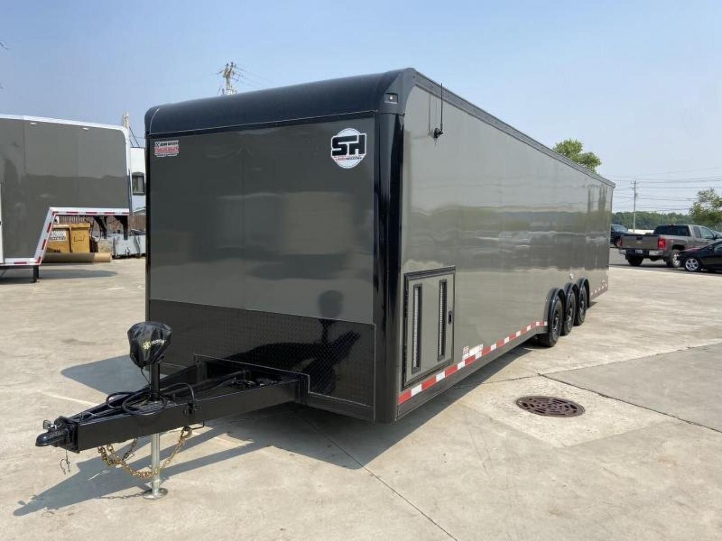 New 34' Car Hauler/Racing Trailer (110V Package & Cabinets) - United Super Hauler