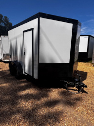 New 2025 7X12 TANDEM AXLE ENCLOSED -7' INTERIOR-WING ON REAR-16  CENTERS-.080 POLYCORE EXTERIOR-1 PIECE ROOF-BLACKOUT PACKAGE Cargo / Enclosed Trailer