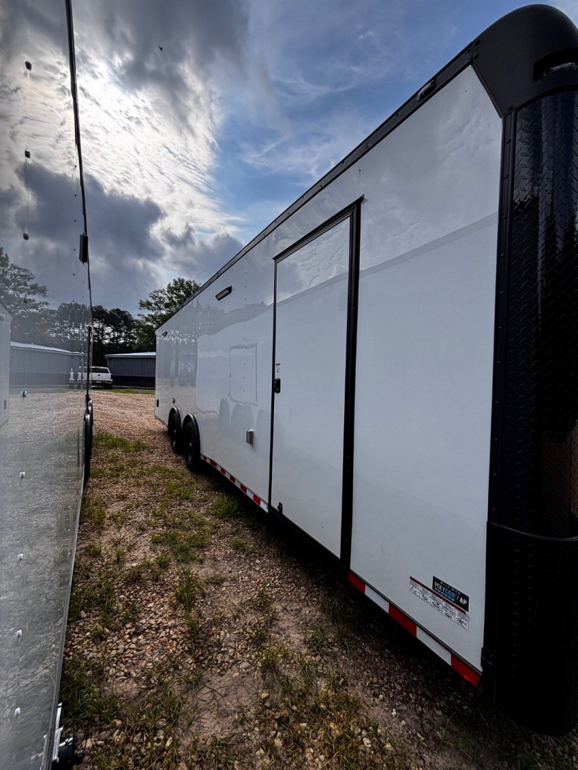 New 2025 8.5X28' RACE TRAILER-ESCAPE DOOR-BLACK OUT TRIM-7' INTERIOR-ELECTRIC JACK-WING-LOADING LIGHTS-GEN COMPARTMENT-MUCH MORE Car / Racing Trailer