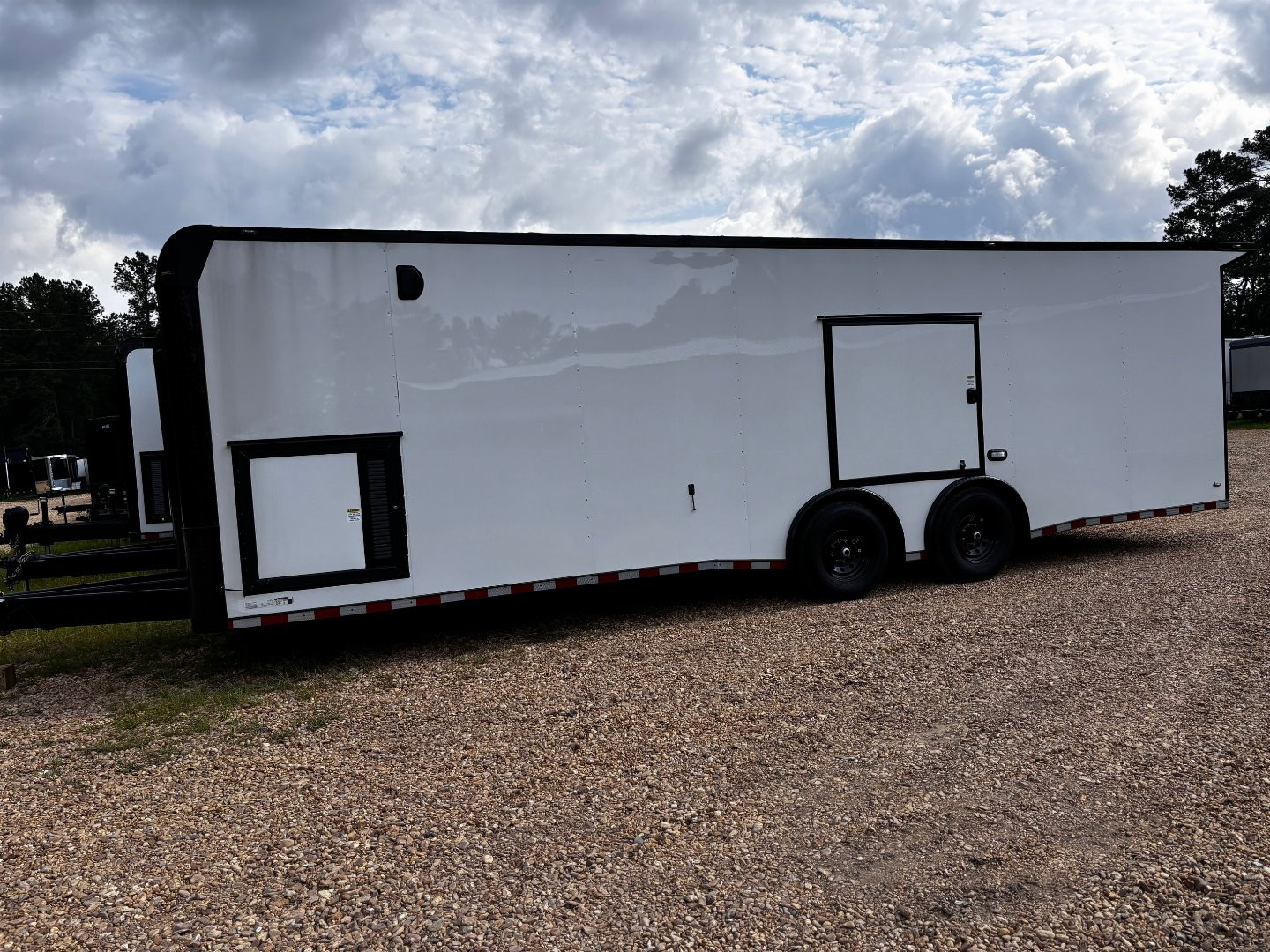 New 2025 8.5X28' RACE TRAILER-ESCAPE DOOR-BLACK OUT TRIM-7