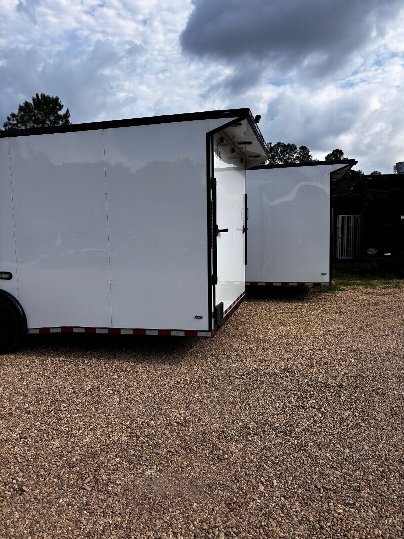 New 2025 8.5X28' RACE TRAILER-ESCAPE DOOR-BLACK OUT TRIM-7' INTERIOR-ELECTRIC JACK-WING-LOADING LIGHTS-GEN COMPARTMENT-MUCH MORE Car / Racing Trailer