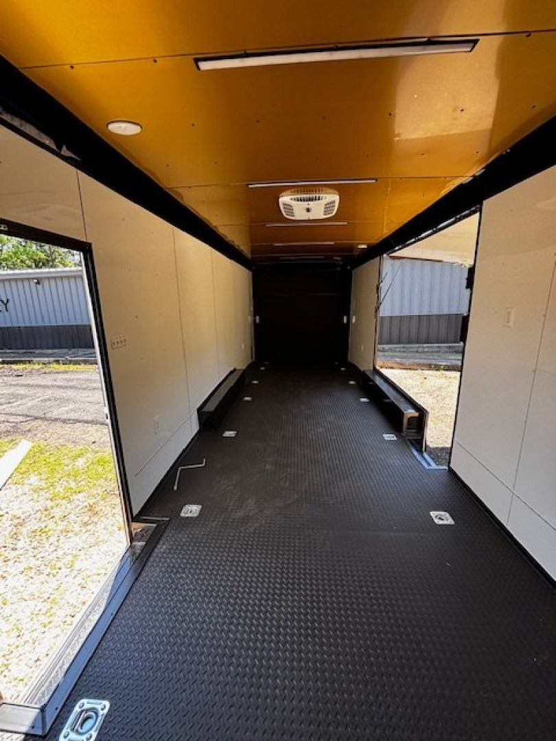 New 2025 8.5X28 RACE TRAILER-ESC DOOR-90" INTERIOR HEIGHT-CABINETS-A/C-SPIDER MAG WHEELS-REAR WING-BLACKOUT TRIM-MUCH MORE Car / Racing Trailer