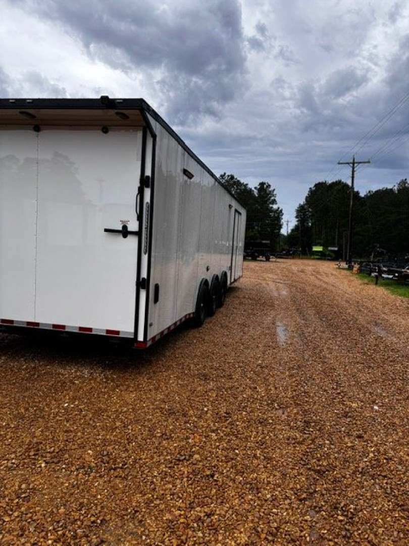 New 2025 8.5X34' BATHROOM RACE TRAILER -BLACKOUT TRIM-ESCAPE DOOR-TRIPLE AXLE-7' INTERIOR HEIGHT-CABINETS Car / Racing Trailer