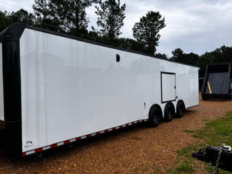 New 2025 8.5X34' BATHROOM RACE TRAILER -BLACKOUT TRIM-ESCAPE DOOR-TRIPLE AXLE-7' INTERIOR HEIGHT-CABINETS Car / Racing Trailer