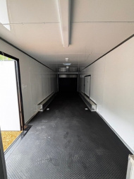 New 2025 8.5X34' BATHROOM RACE TRAILER -BLACKOUT TRIM-ESCAPE DOOR-TRIPLE AXLE-7' INTERIOR HEIGHT-CABINETS Car / Racing Trailer