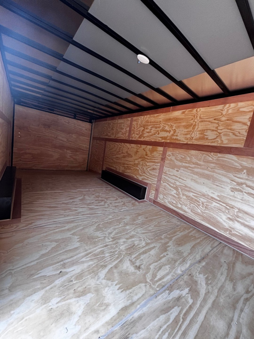 New 2025 8.5X20 ENCLOSED CAR HAULER-16" CENTERS-1 PIECE ROOF-.080 POLYCORE EXTERIOR-BLACKOUT PACKAGE