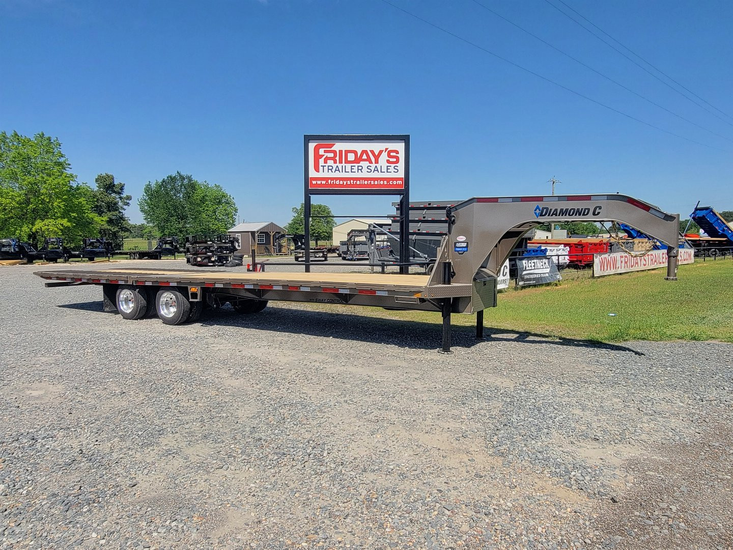New 2025 Diamond C Trailers FMAX212 32' x 102" Hydraulic Dovetail Pacesetter Edition