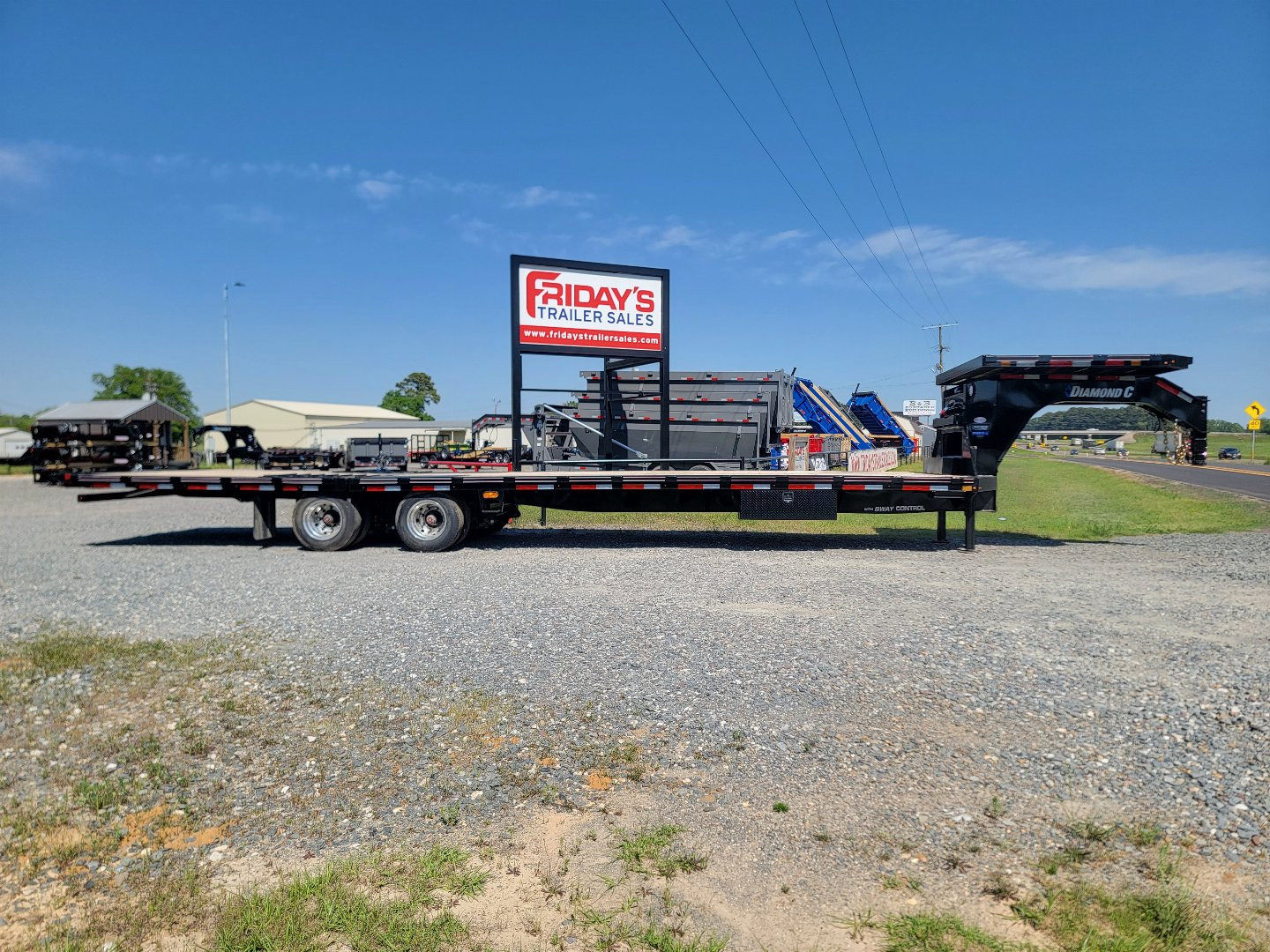 New 2025 Diamond C Trailers FMAX216 35' x 102" 40K Hydraulic Dovetail Pacesetter Edition