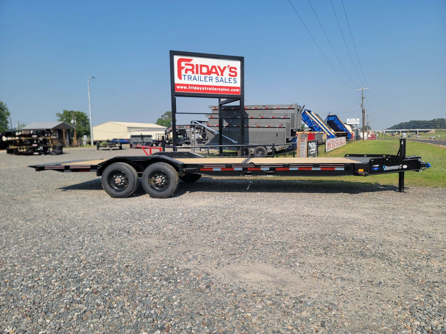 New 2025 Diamond C Trailers HDT210 24' x 82" Tilt Trailer Pacesetter Edition Equipment Trailer