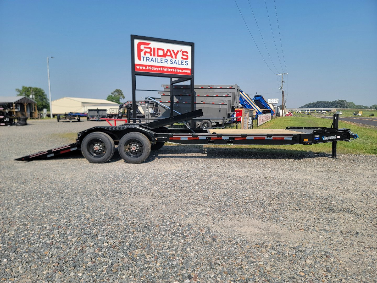 New 2025 Diamond C Trailers HDT210 24' x 82" Tilt Trailer Pacesetter Edition Equipment Trailer